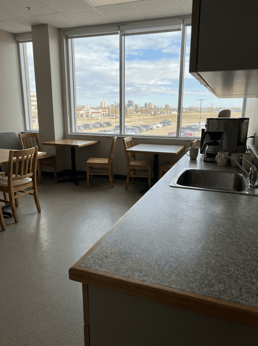 Laminate countertops for commercial use in modern office breakroom by Broadway Millwork in Saskatoon, SK